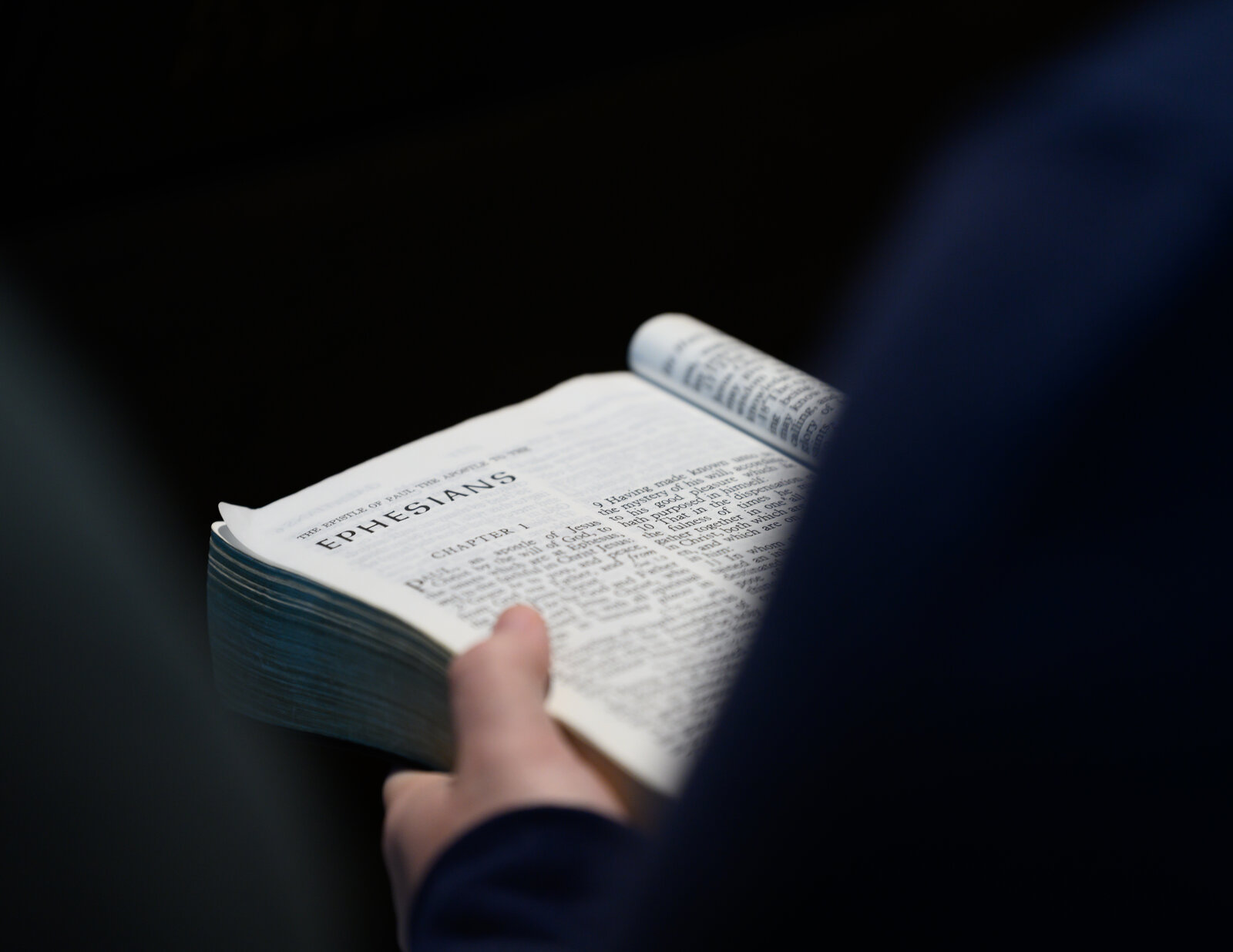 An open Bible on Ephesians chapter 1 during worship at Pray's Mill